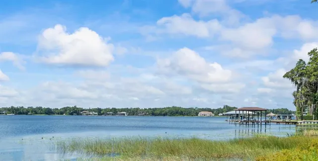 a view of swimming pool and mountain in back