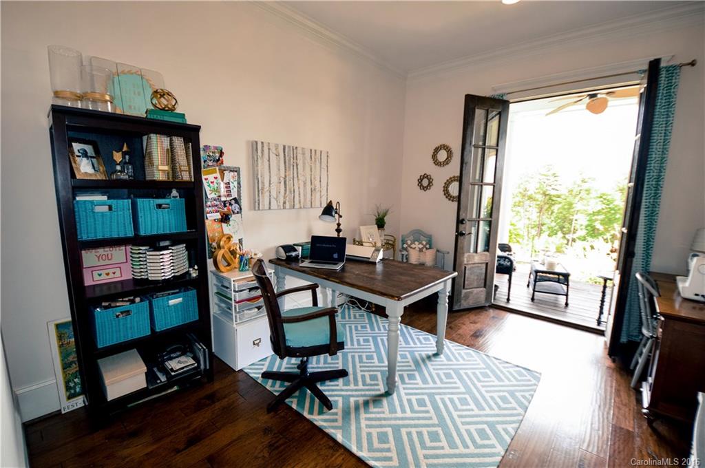 1024 Perriwinkle Lane Fort Mill, SC 29708 - Photo 11 of 24 a view of a workspace with furniture and a living room