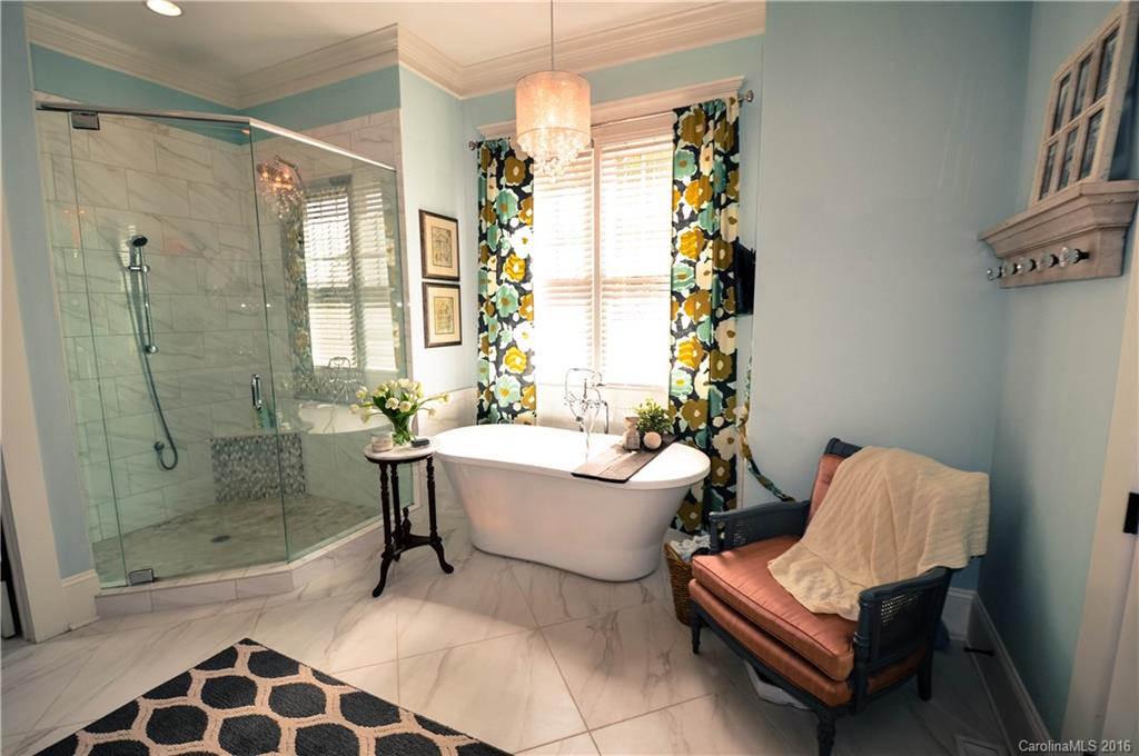 1024 Perriwinkle Lane Fort Mill, SC 29708 - Photo 13 of 24 a bathroom with a bathtub and shower