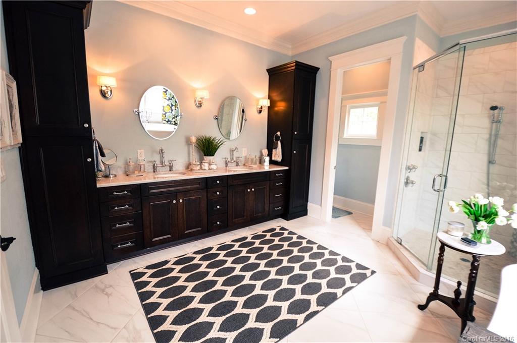 1024 Perriwinkle Lane Fort Mill, SC 29708 - Photo 14 of 24 a spacious bathroom with a sink and a mirror