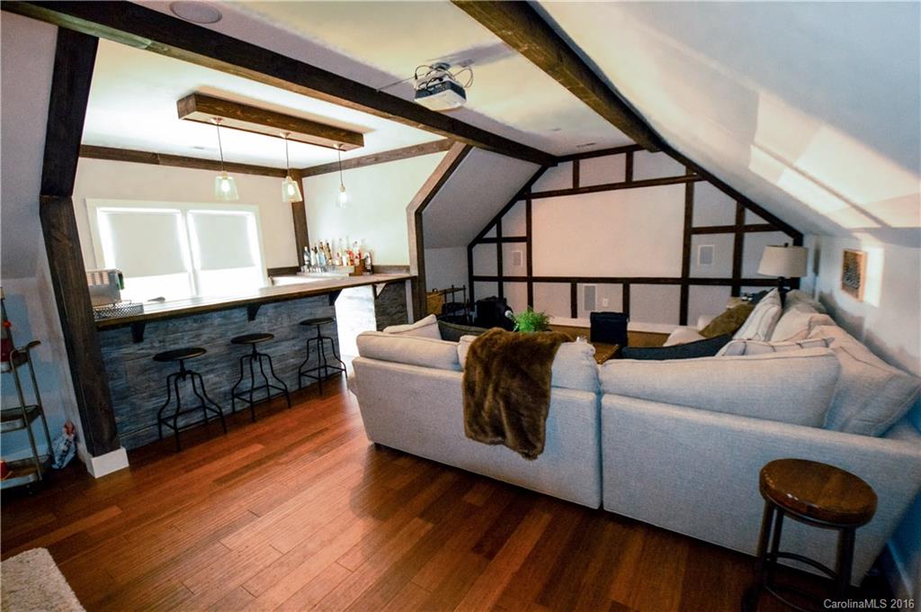 1024 Perriwinkle Lane Fort Mill, SC 29708 - Photo 16 of 24 a living room with furniture and a wooden floor