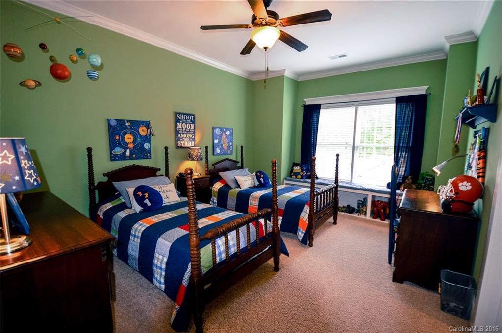 1024 Perriwinkle Lane Fort Mill, SC 29708 - Photo 18 of 24 a bedroom with two beds and a window