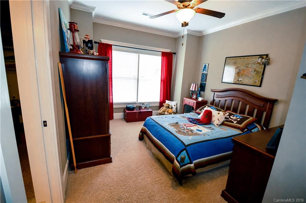 1024 Perriwinkle Lane Fort Mill, SC 29708 - Photo 20 of 24 a bedroom with furniture and a window