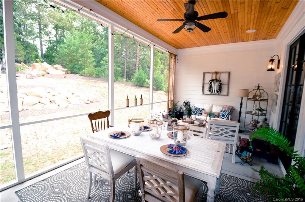 1024 Perriwinkle Lane Fort Mill, SC 29708 - Photo 23 of 24 a view of a dining room with furniture window and outside view