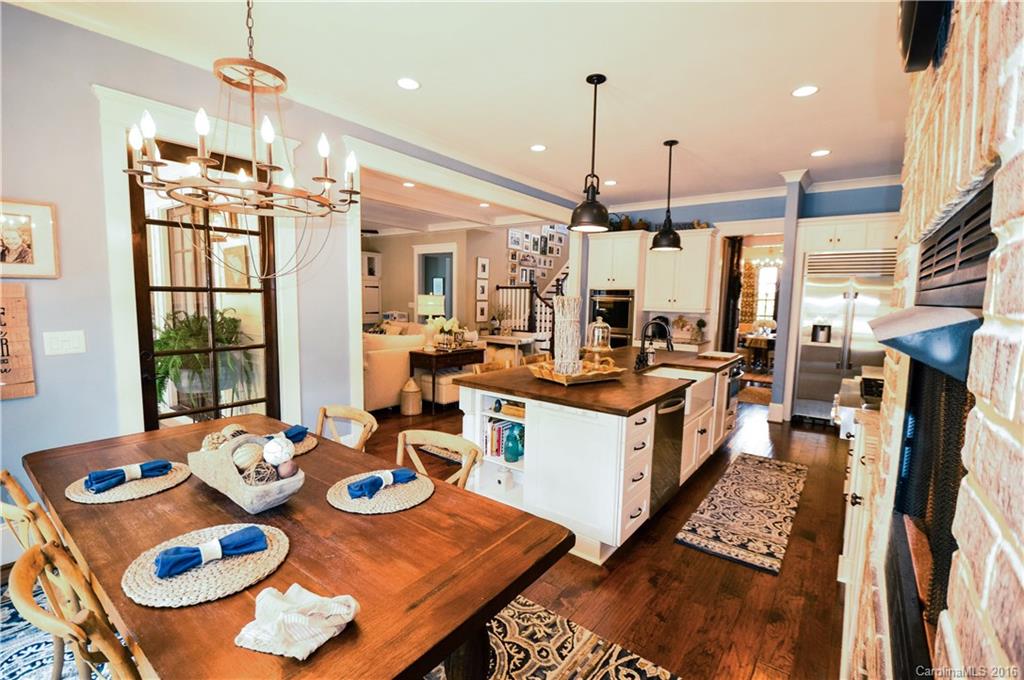 1024 Perriwinkle Lane Fort Mill, SC 29708 - Photo 8 of 24 a large kitchen with a table and chairs