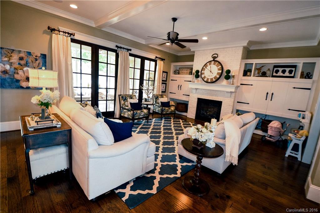 1024 Perriwinkle Lane Fort Mill, SC 29708 - Photo 10 of 24 a living room with furniture a fireplace and a large window