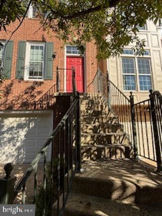 9404 Regency Crest Drive Vienna, VA 22181 - Photo 2 of 25 front view of house with a entrance
