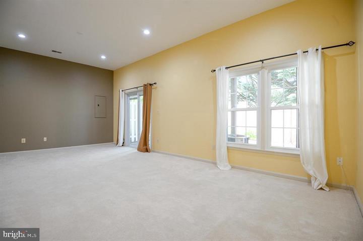 9404 Regency Crest Drive Vienna, VA 22181 - Photo 21 of 25 a view of an empty room with a window