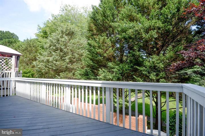 9404 Regency Crest Drive Vienna, VA 22181 - Photo 23 of 25 a view of a wooden deck