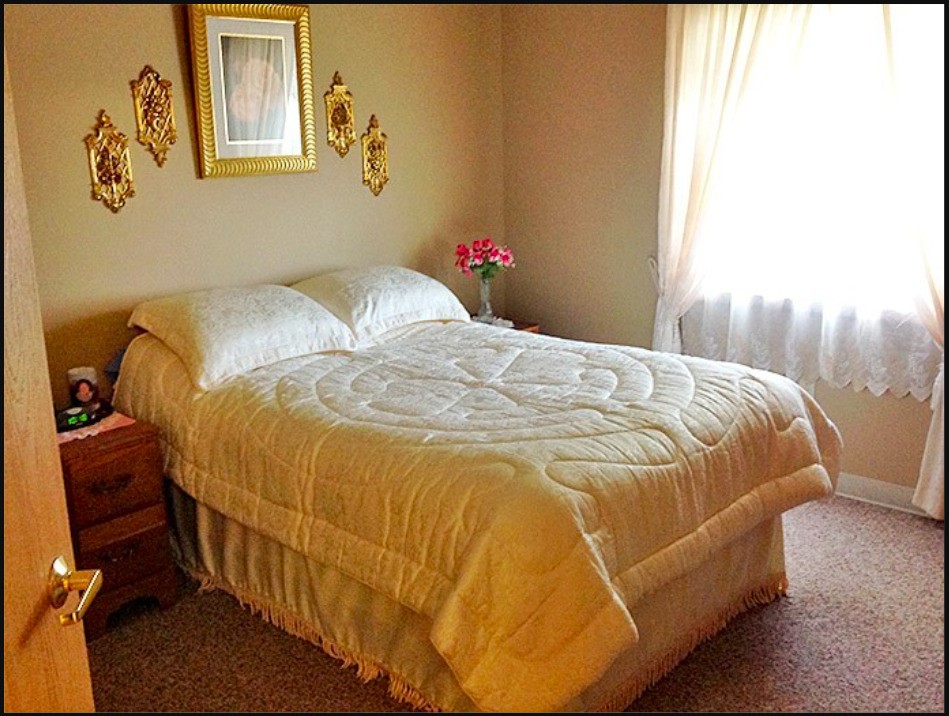 741 Streeter Drive Other, SD 57049 - Photo 6 of 10 a bedroom with a bed and window