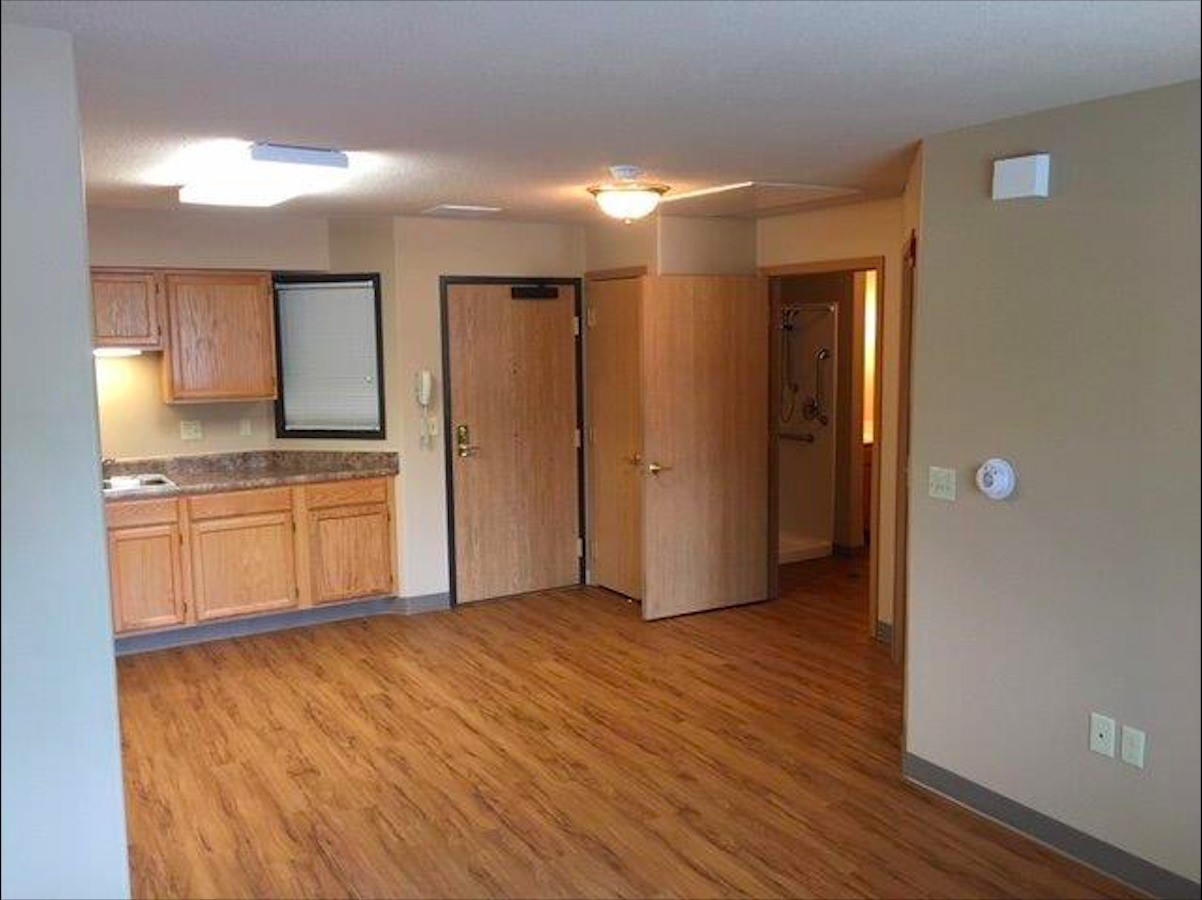 741 Streeter Drive Other, SD 57049 - Photo 8 of 10 a view of a kitchen with a sink and a refrigerator