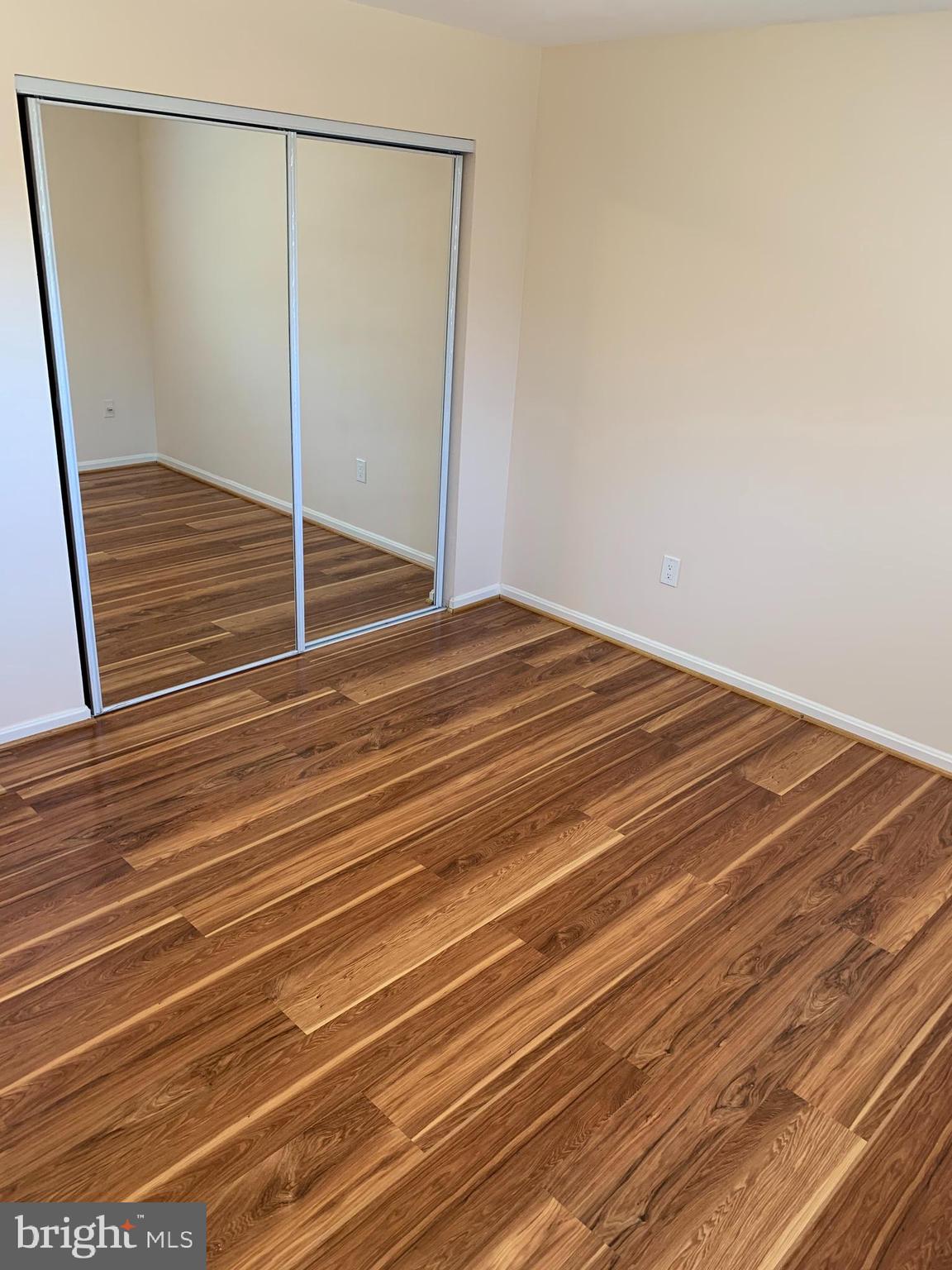 2 Normandy Square Court, Unit D Silver Spring, MD 20906 - Photo 11 of 23 a view of a room with wooden floor