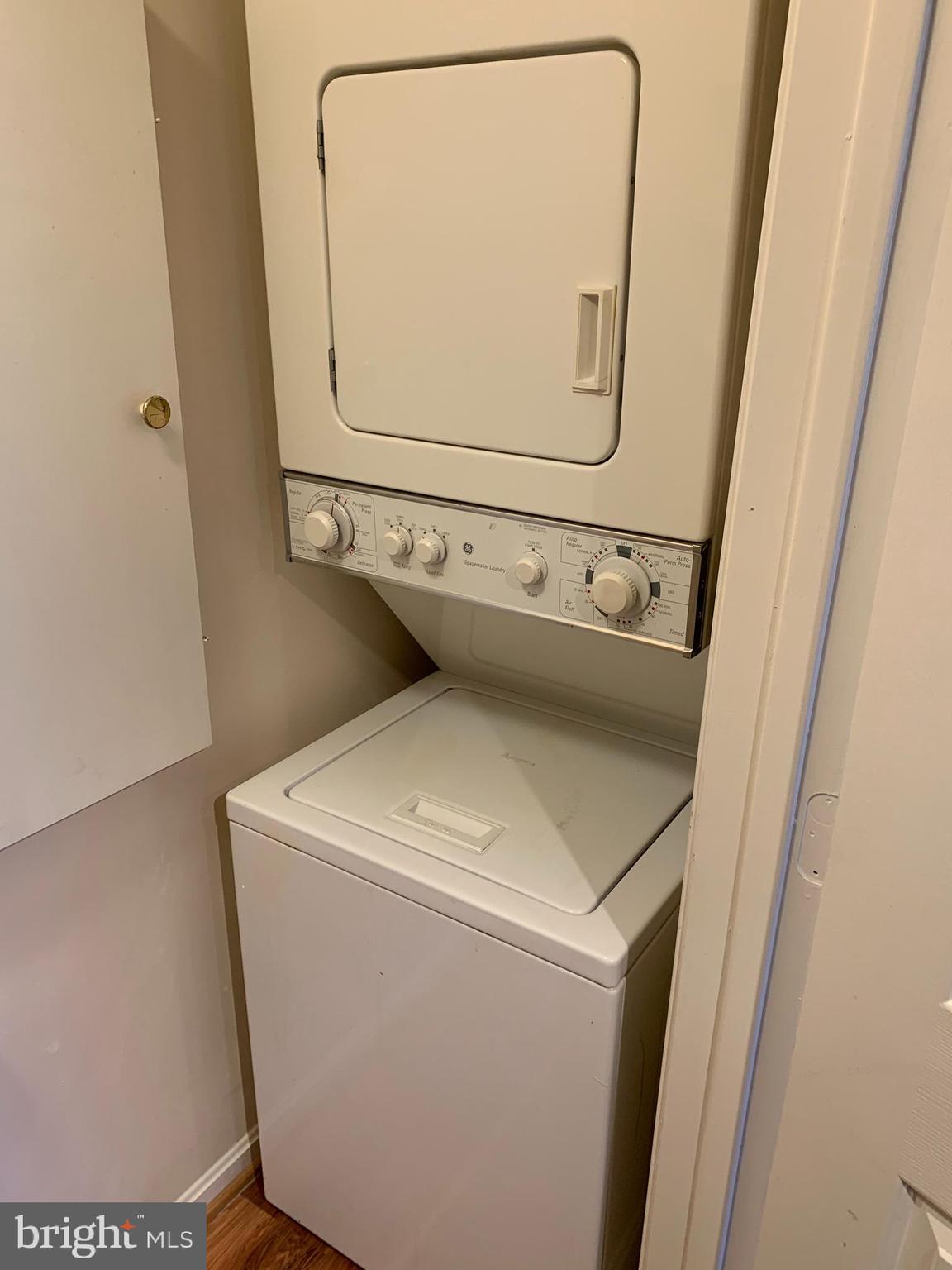 2 Normandy Square Court, Unit D Silver Spring, MD 20906 - Photo 22 of 23 a utility room with dryer and washer