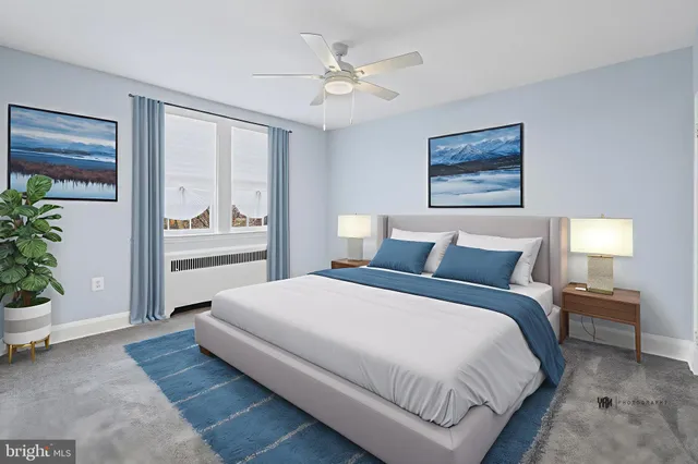 a bedroom with bed and a window