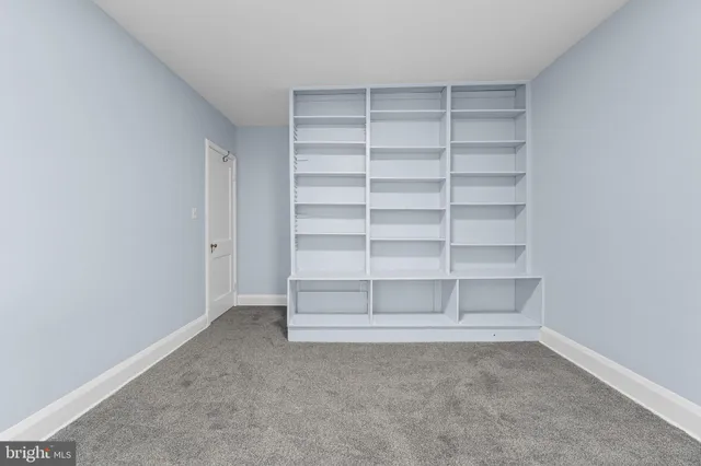 a view of an empty room with empty racks