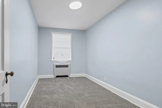 a view of an empty room with window