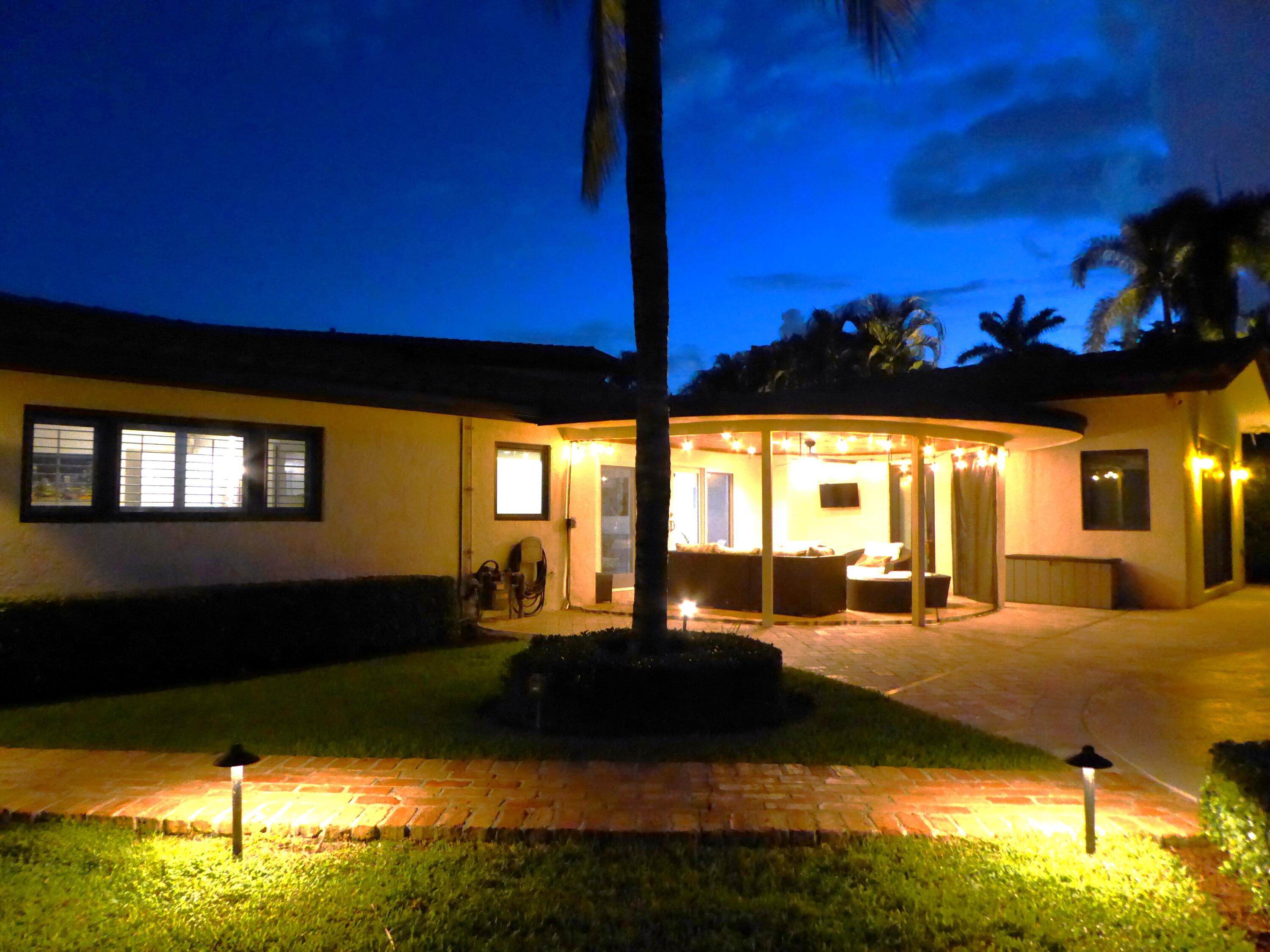 1069 West Palmetto Park Road Boca Raton, FL 33486 - Photo 51 of 54 Back Patio Dusk