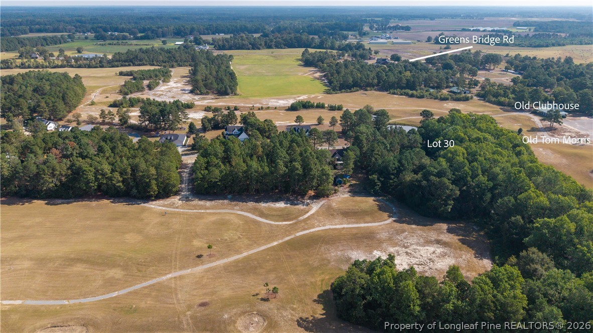Old Tom Morris Road Garland, NC 28441 - Photo 2 of 4 an aerial view of residential houses with outdoor space and river