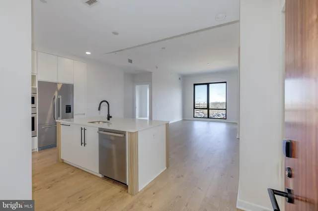 $770,000 | 255 West Falls Station Boulevard, Unit 410, Falls Church, VA 22043