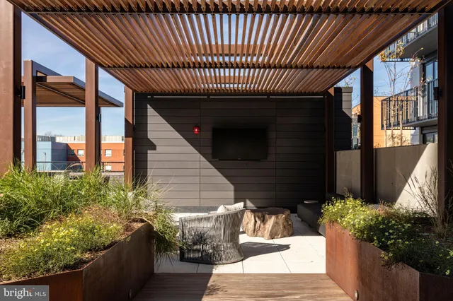 a outdoor living space with furniture and garden view