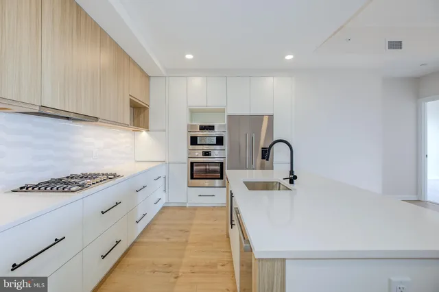 $770,000 | 255 West Falls Station Boulevard, Unit 410, Falls Church, VA 22043