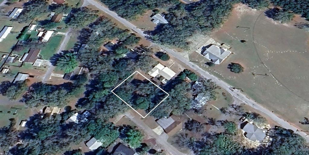 Northeast 3rd Street Chiefland, FL 32626 - Photo 4 of 5 an aerial view of residential house with outdoor space