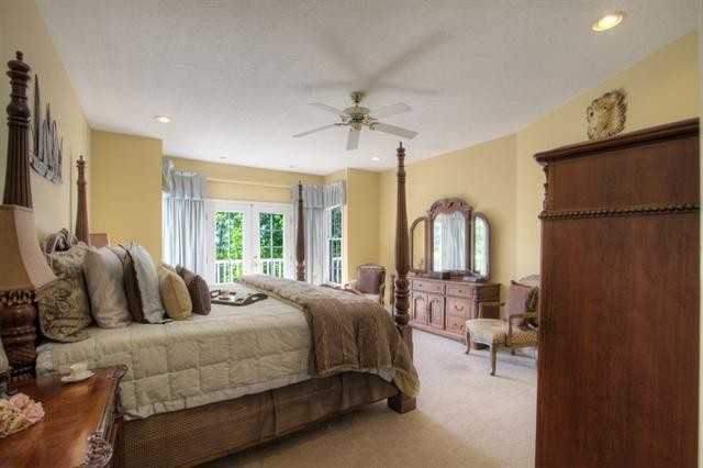 868 Reed Road Ten Mile, TN 37880 - Photo 14 of 40 a bedroom with a bed couch and a window