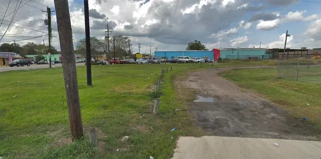 a front view of a building with street view