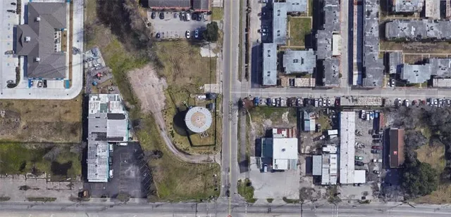 a picture of a book and a white bed