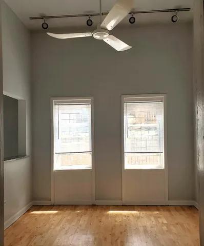 a view of an empty room with a window