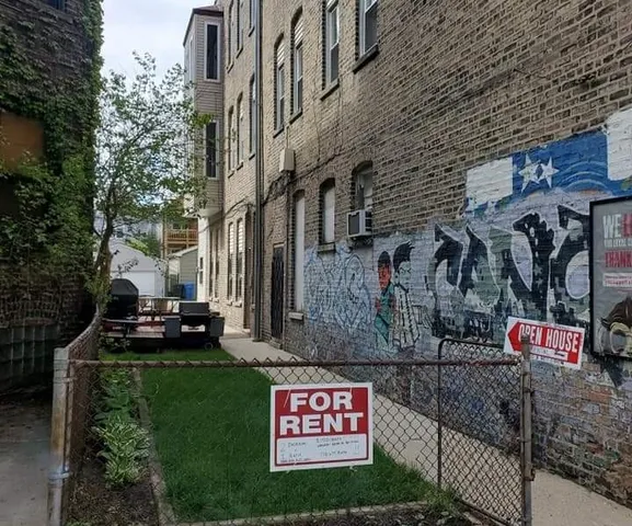 a sign that is on the side of the building