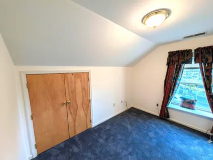 an empty room with window