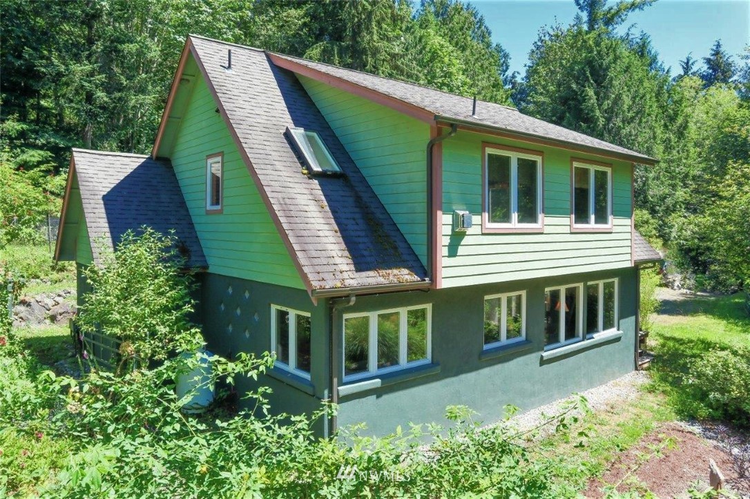 105 Naylor Creek Road Chimacum, WA 98325 - Photo 2 of 24 a view of house with outdoor space