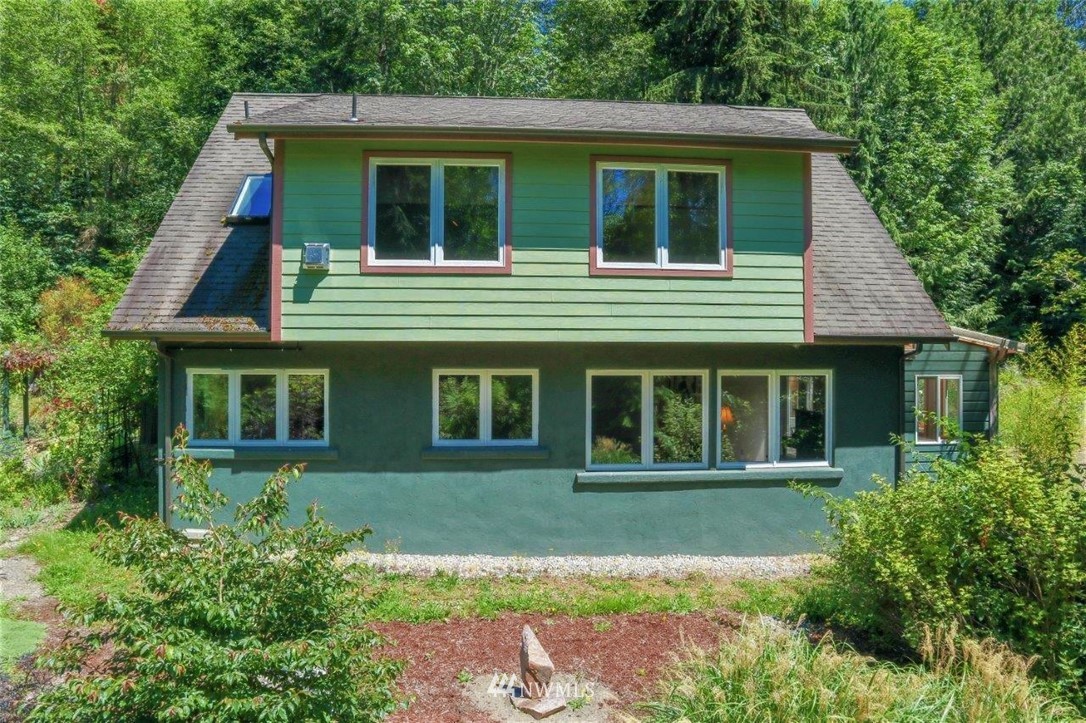 105 Naylor Creek Road Chimacum, WA 98325 - Photo 3 of 24 a front view of a house