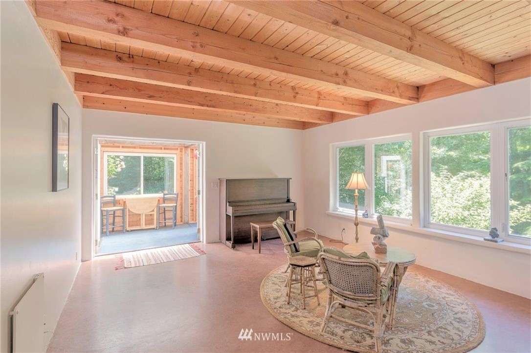 105 Naylor Creek Road Chimacum, WA 98325 - Photo 5 of 24 a living room with furniture and a large window