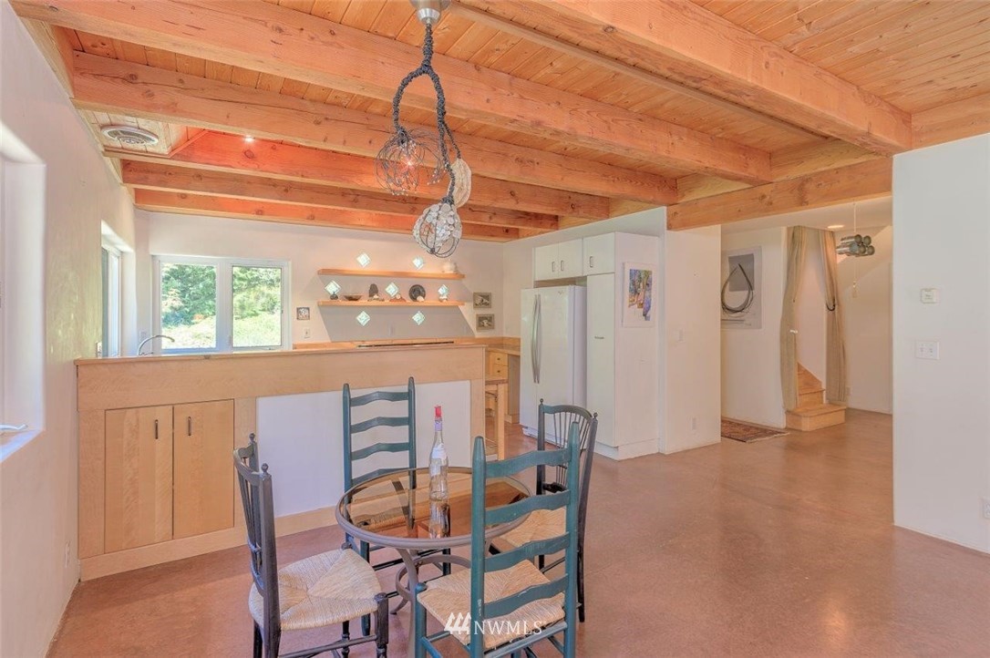 105 Naylor Creek Road Chimacum, WA 98325 - Photo 7 of 24 a dining room with furniture and window
