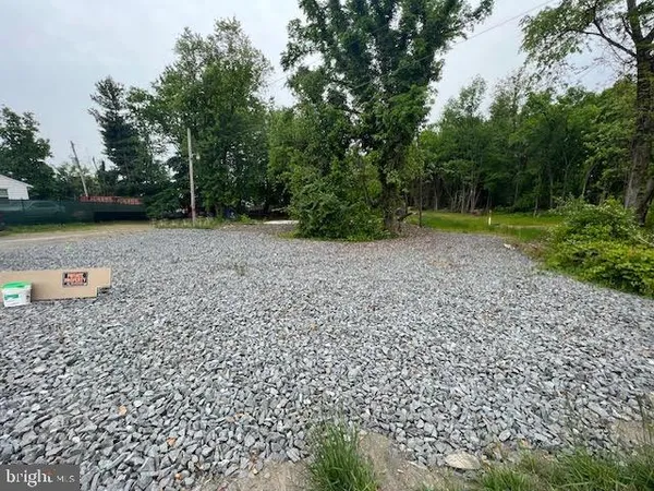 a view of a tiny house with a yard