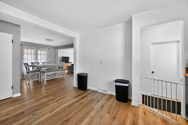 a view of a living room and dining room