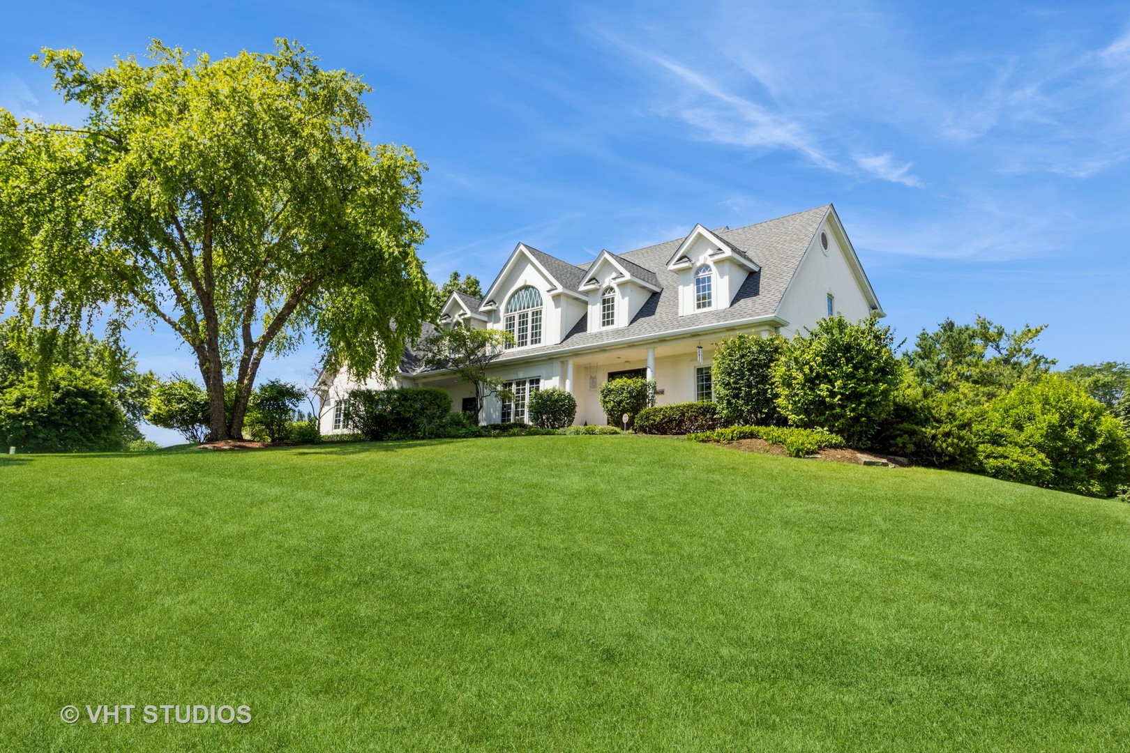18N250 Sawyer Road Dundee, IL 60102 - Photo 2 of 12 a front view of a house with a garden