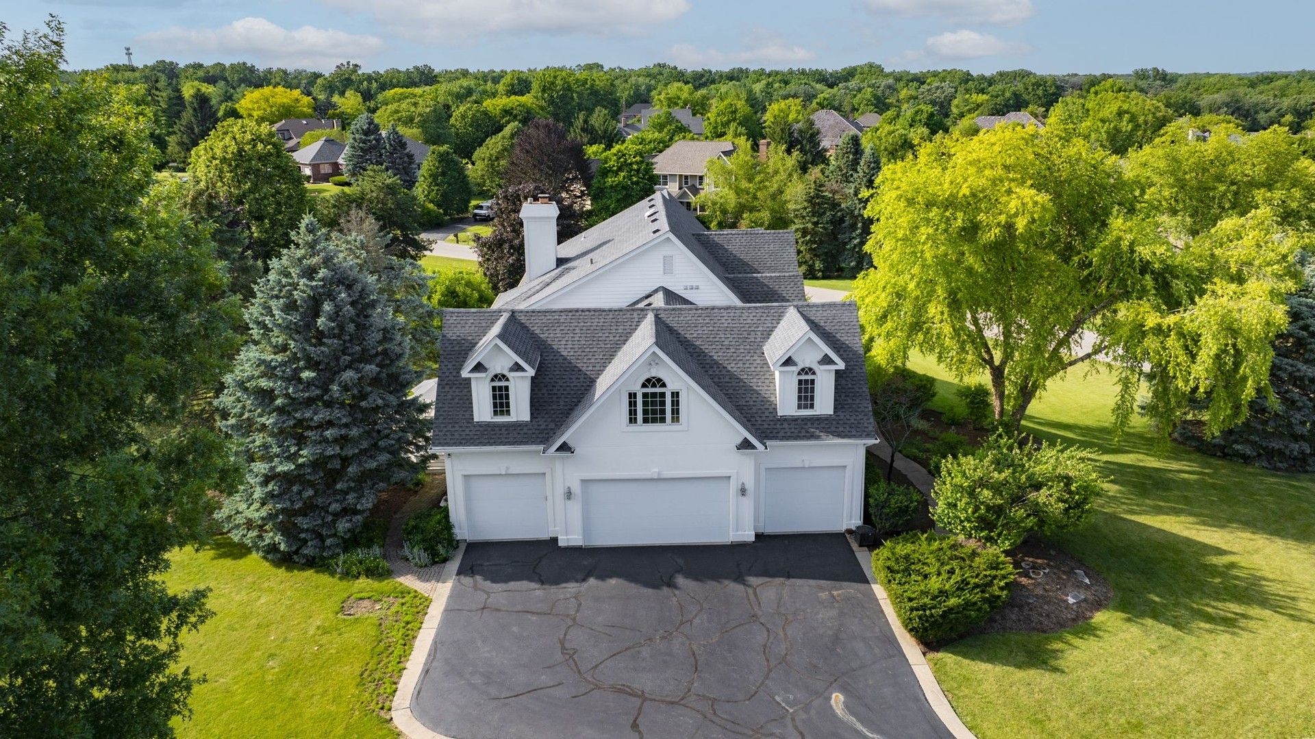 18N250 Sawyer Road Dundee, IL 60102 - Photo 10 of 12 a house with trees in the background