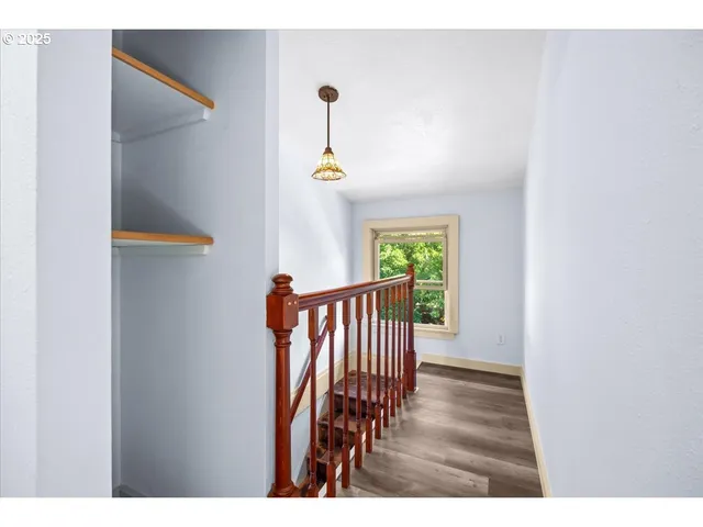 a view of entryway with wooden floor