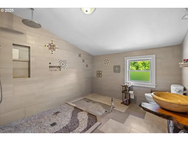 a living room with furniture and window