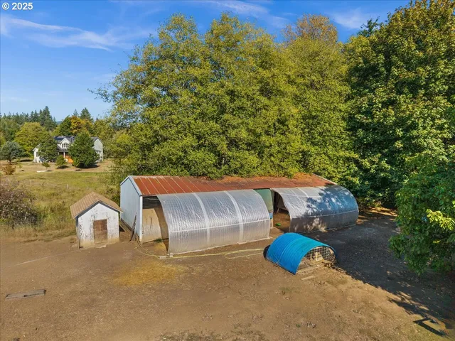 a view of a yard with an outdoor space and seating area