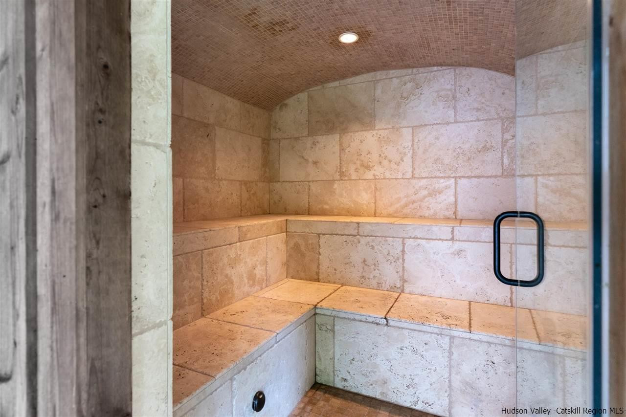 58 Old Powdermill Road Saugerties, NY 12477 - Photo 19 of 35 a bathroom with a shower and a sink