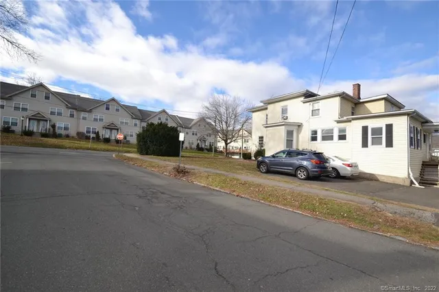 a view of a city street from a building