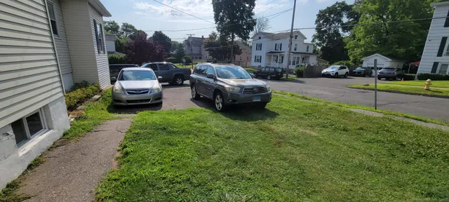 a view of a house with a back yard
