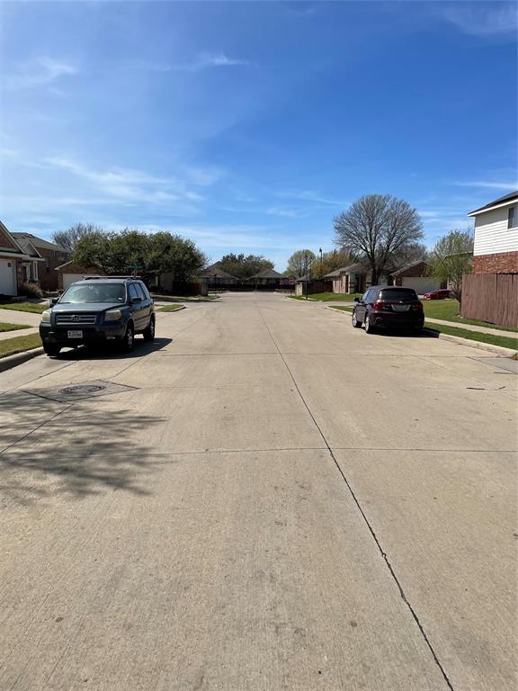 1004 Concan Drive Forney, TX 75126 - Photo 23 of 24 a car parked on the side of the road