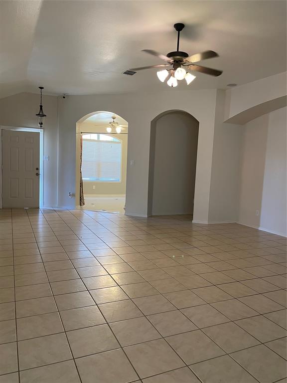 1004 Concan Drive Forney, TX 75126 - Photo 3 of 24 a view of a hallway with a chandelier