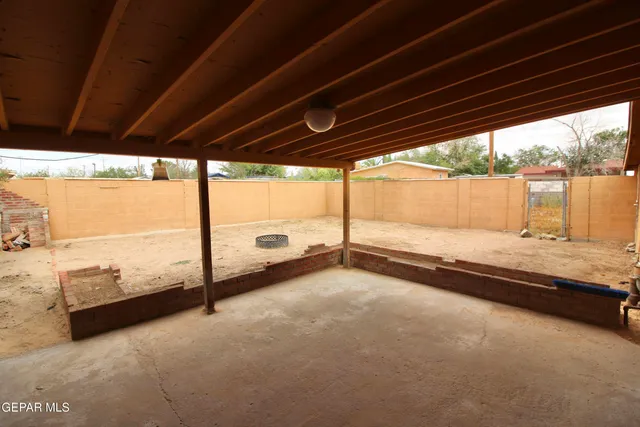 a view of an ocean and trees in a balcony