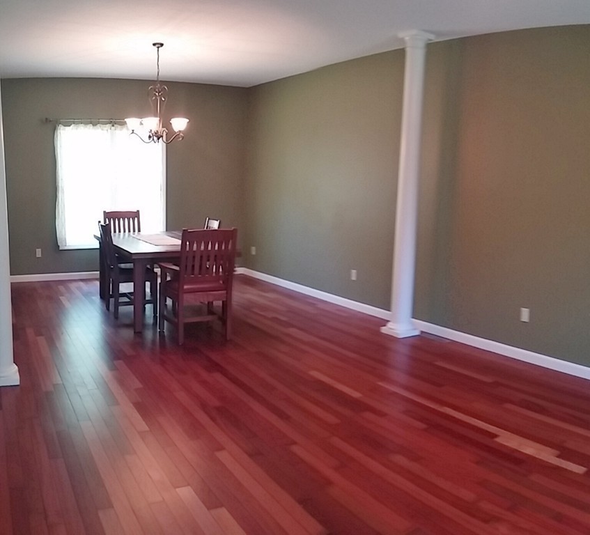 79 Crooked Ledge Road Southampton, MA 01073 - Photo 4 of 19 a view of a dining room with furniture and wooden floor